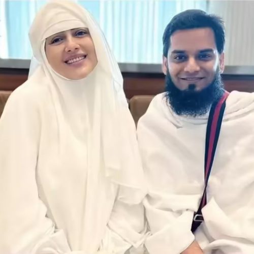 கணவருடன் நடிகை சனா கான்